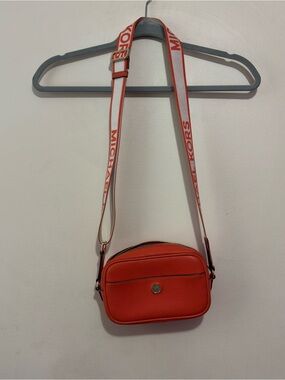 Michael Kors Coral-Orange Pebbled Leather Crossbody with Logo Strap